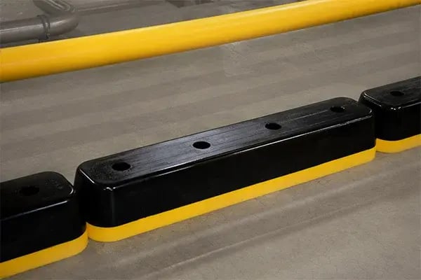 step guard safety curb on warehouse floor