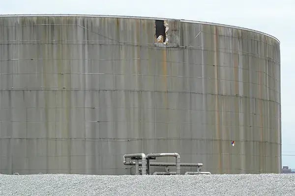 wind damaged storage tank insulation