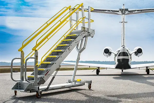 adjustable height rolling ladder used for aircraft maintenance