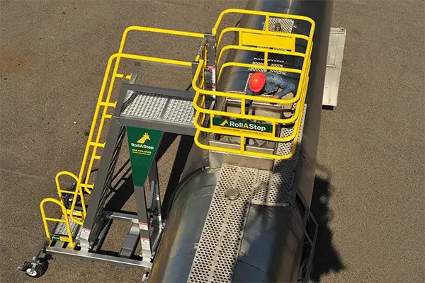 cantilever rolling ladder provides safe access over tanker truck