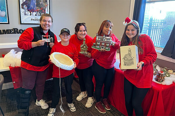 ronald mcdonald house of southern new jersey 2024 setting up christmas decorations in the game room